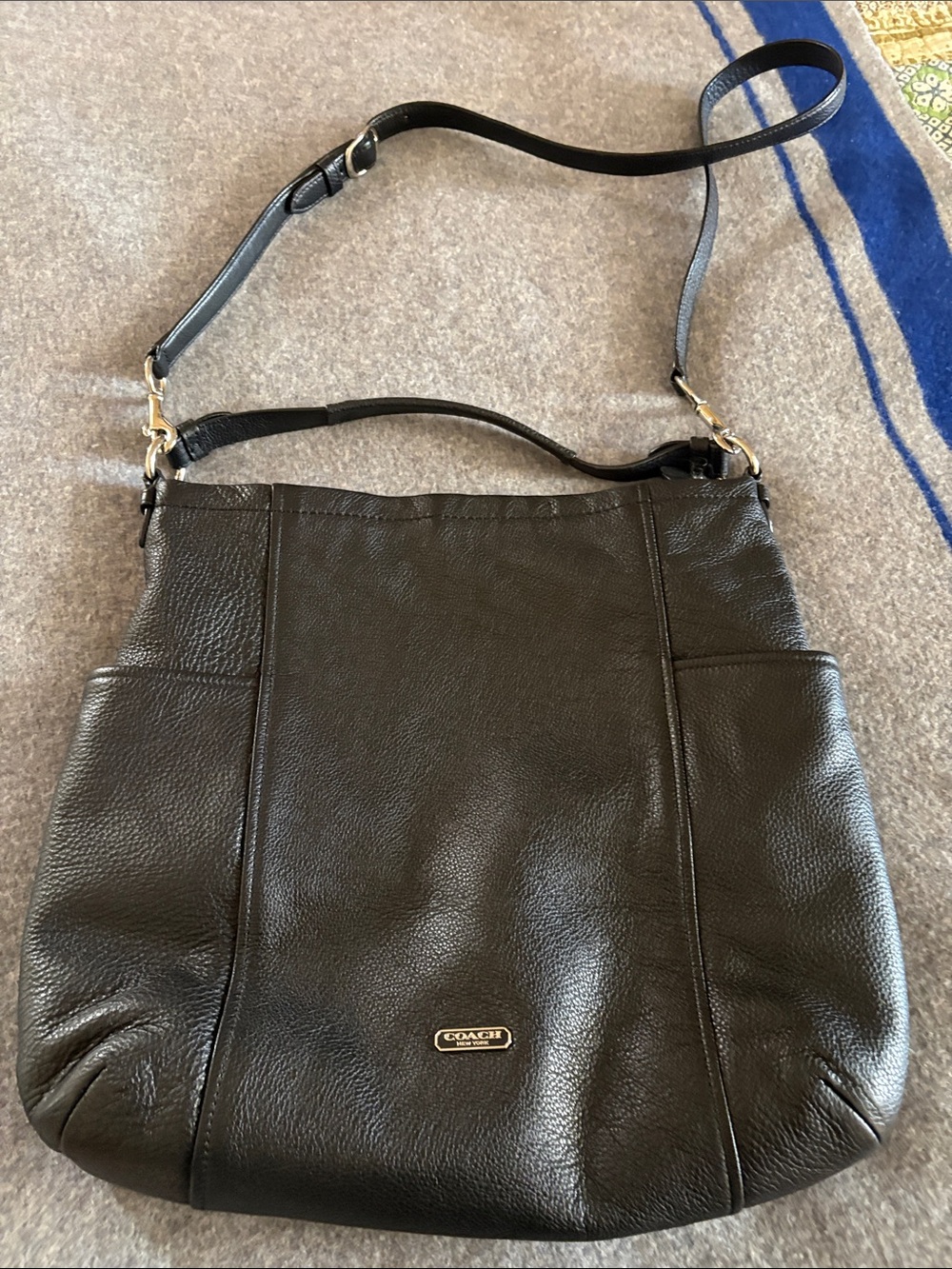 Coach shoulder/cross body unstructured bag.